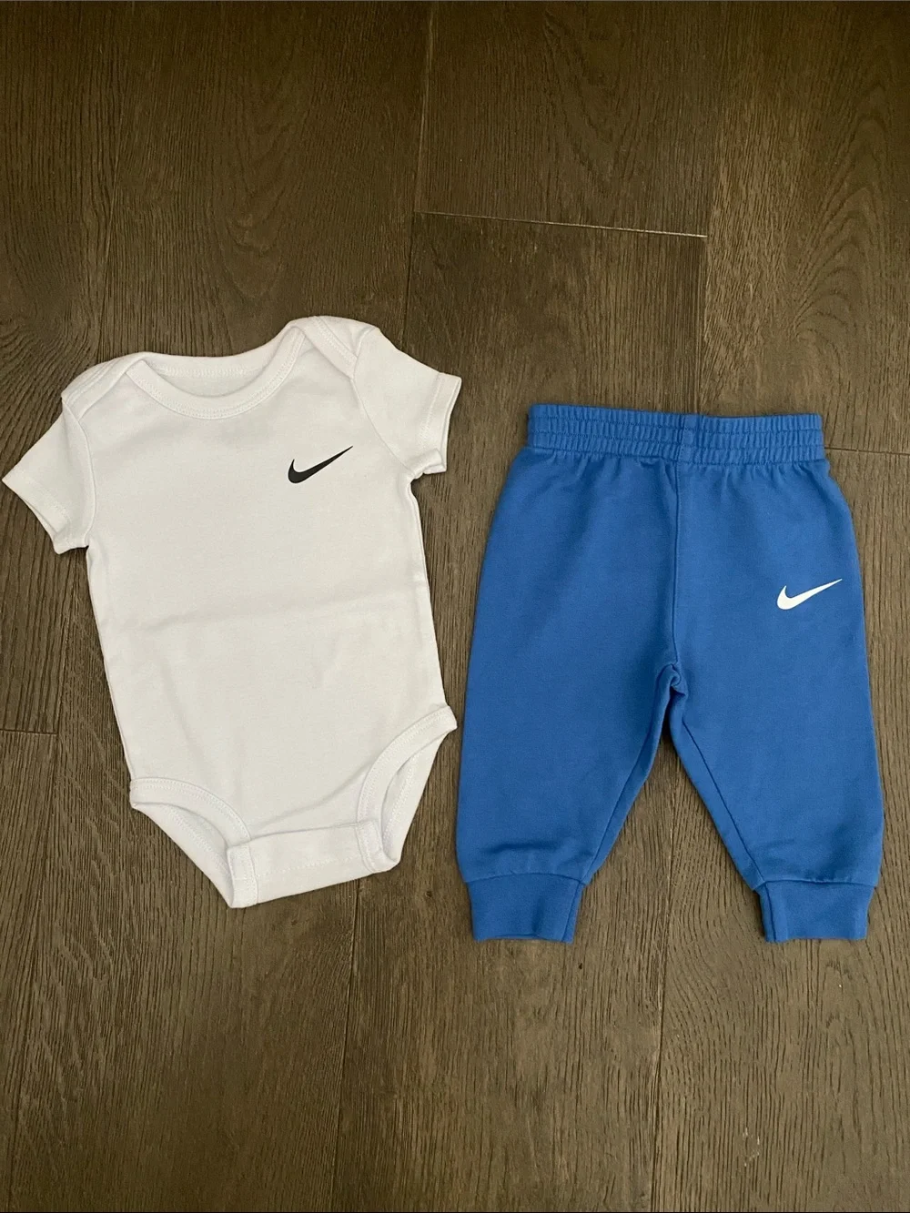 Nike White Bodysuit with Blue Joggers Baby Set